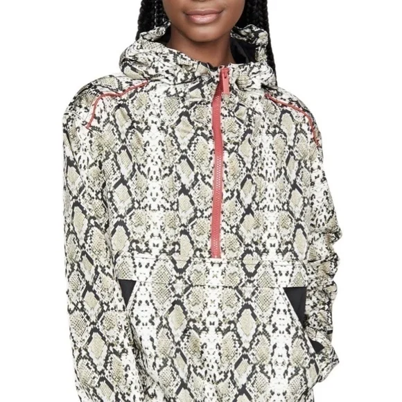ALALA snakeskin anorak with red accents
